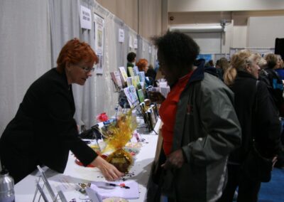 Lynda Bailey signs books at the 11th Annual Women's Expo in Reno, NV.